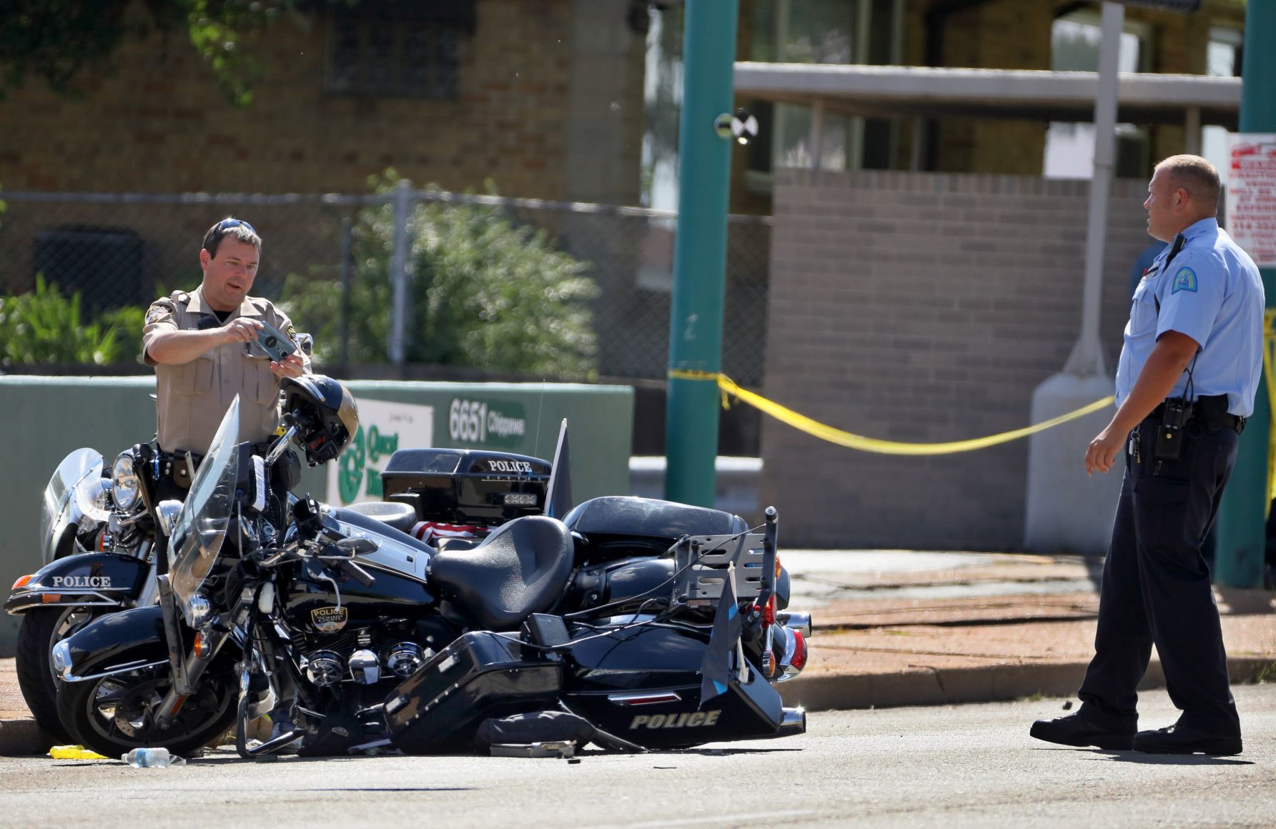 Motorcycle cops injured in Langsdorf motorcade